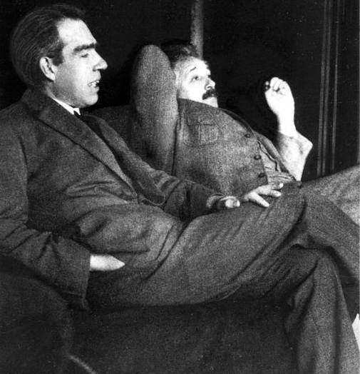 Bohr and Einstein arguing.